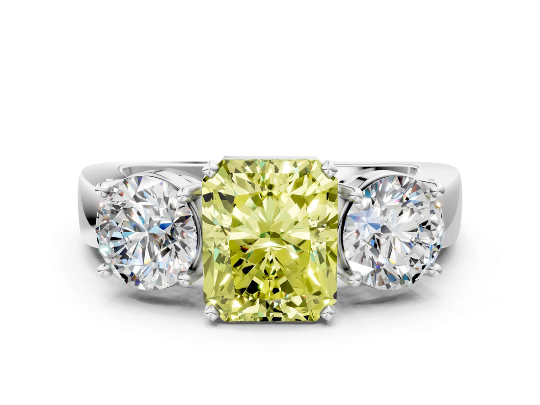 White gold Three-Stone Fancy Yellow Radiant Cut Diamond Ring with Round Side Stones, Classic Band, and Four-Prong Setting