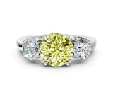 White gold Three-Stone Fancy Yellow Round Cut Cut Diamond Ring with Channel Set Band and Four-Prong Setting_12