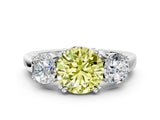 White gold Three-Stone Fancy Yellow Round Cut Cut Diamond Ring with Channel Set Band and Four-Prong Setting_48