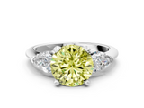 White gold Three-Stone Fancy Yellow Round  Diamond Ring with Pear Side Stones in Four-Prong Setting