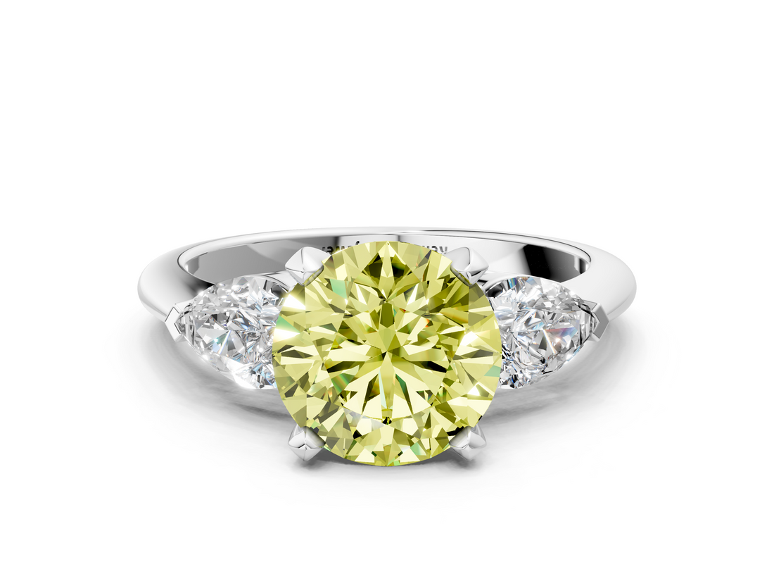 White gold Three-Stone Fancy Yellow Round  Diamond Ring with Pear Side Stones in Four-Prong Setting