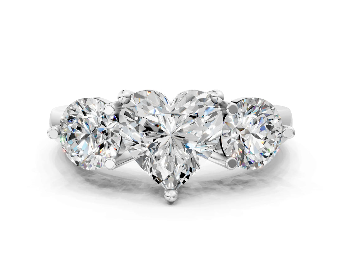 White gold Three-Stone Heart Brilliant Cut Solitaire Ring with Prong Setting on a Classic Band