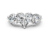 White gold Three-Stone Heart Brilliant Cut Solitaire Ring with Prong Setting on a Classic Band