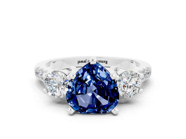 Platinum Three-Stone Heart Cut Blue Sapphire Pavé Band with Four-Prong Setting