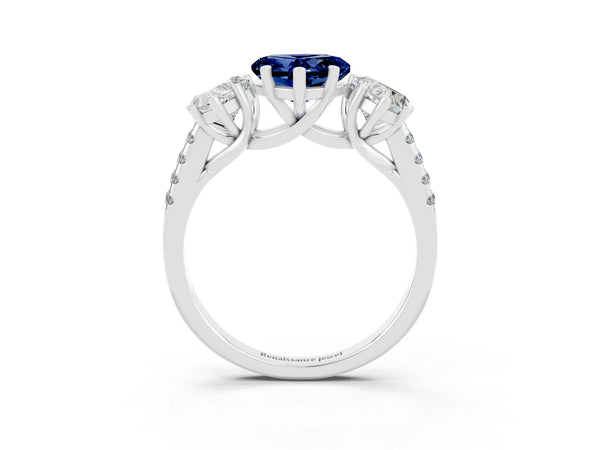 Silver Three-Stone Heart Cut Blue Sapphire Ring with Round  Pavé Band and Prong Setting
