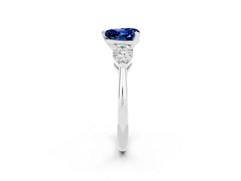 White gold Three-Stone Heart Cut Blue Sapphire Ring with Pear Side Stones and Four-Prong Setting_2