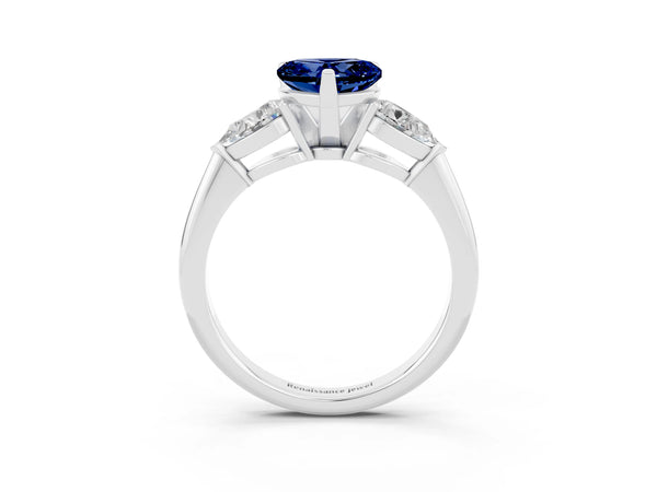 Platinum Three-Stone Heart Cut Blue Sapphire Ring with Pear Side Stones and Four-Prong Setting