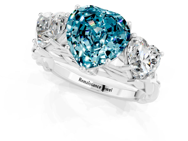 Silver Three-Stone Heart Cut Blue Topaz Braided Band Ring with Four-Prong Setting