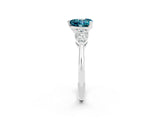 White gold Three-Stone Heart Cut Blue Topaz Ring with Pear Side Stones and Four-Prong Setting_2