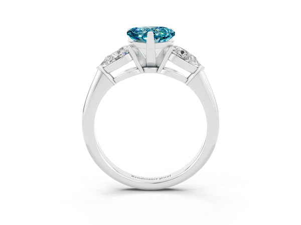 Silver Three-Stone Heart Cut Blue Topaz Ring with Pear Side Stones and Four-Prong Setting