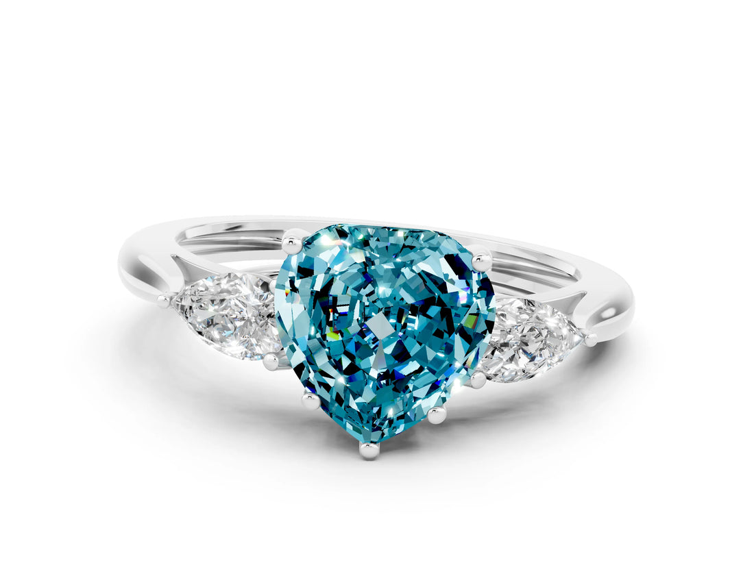 White gold Three-Stone Heart Cut Blue Topaz Ring with Pear  Side Stones in Four-Prong Setting_12