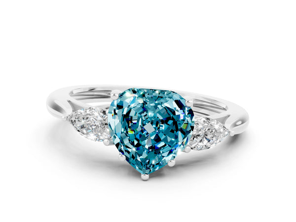 White gold Three-Stone Heart Cut Blue Topaz Ring with Pear  Side Stones in Four-Prong Setting