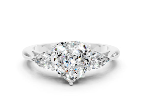 White gold Three-Stone Heart Cut Cut Diamond Ring with Pear Side Stones in Four-Prong Setting
