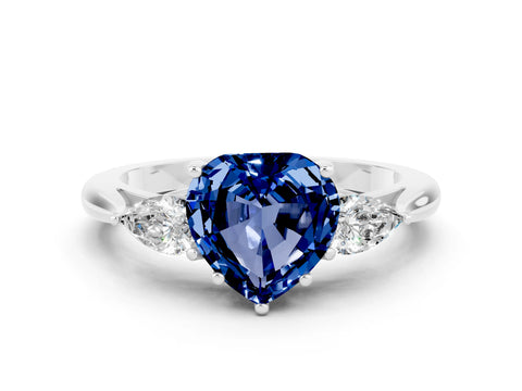 White gold Three-Stone Heart Cut Cut Diamond Ring with Pear Side Stones in Four-Prong Setting