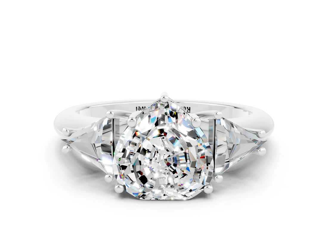 White gold Three-Stone Heart Cut Cut Diamond Ring with Trillion Side Stones and Four-Prong Setting