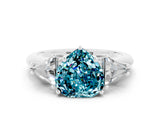 White gold Three-Stone Heart Cut Cut Diamond Ring with Trillion Side Stones and Four-Prong Setting