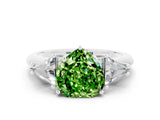 White gold Three-Stone Heart Cut Cut Diamond Ring with Trillion Side Stones and Four-Prong Setting