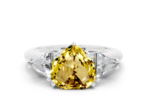 Silver Three-Stone Heart Cut Cut Diamond Ring with Trillion Side Stones and Four-Prong Setting
