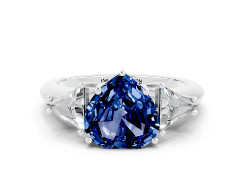 White gold Three-Stone Heart Cut Cut Diamond Ring with Trillion Side Stones and Four-Prong Setting