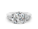 White gold Three-Stone Heart Cut Cut Diamond Ring with Trillion Side Stones and Four-Prong Setting