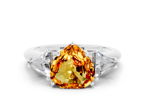 White gold Three-Stone Heart Cut Cut Diamond Ring with Trillion Side Stones and Four-Prong Setting