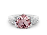 White gold Three-Stone Heart Cut Cut Diamond Ring with Trillion Side Stones and Four-Prong Setting