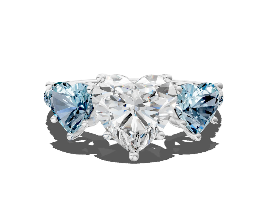 White gold Three-Stone Heart Cut Diamond Ring with Round with Aquamarine side stone Pavé Band and Prong Setting