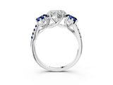 White gold Three-Stone Heart Cut Diamond Ring with Round with Blue Sapphire side stone Pavé Band and Prong Setting_15