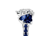 White gold Three-Stone Heart Cut Diamond Ring with Round with Blue Sapphire side stone Pavé Band and Prong Setting_17
