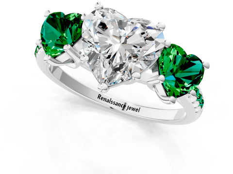 White gold Three-Stone Heart Cut Diamond Ring with Round with Emerald side stone Pavé Band and Prong Setting_1