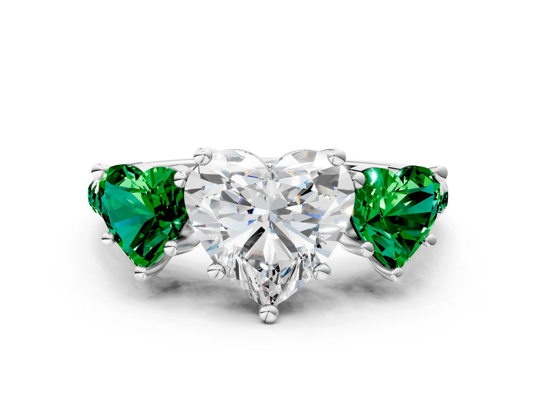 White gold Three-Stone Heart Cut Diamond Ring with Round with Emerald side stone Pavé Band and Prong Setting