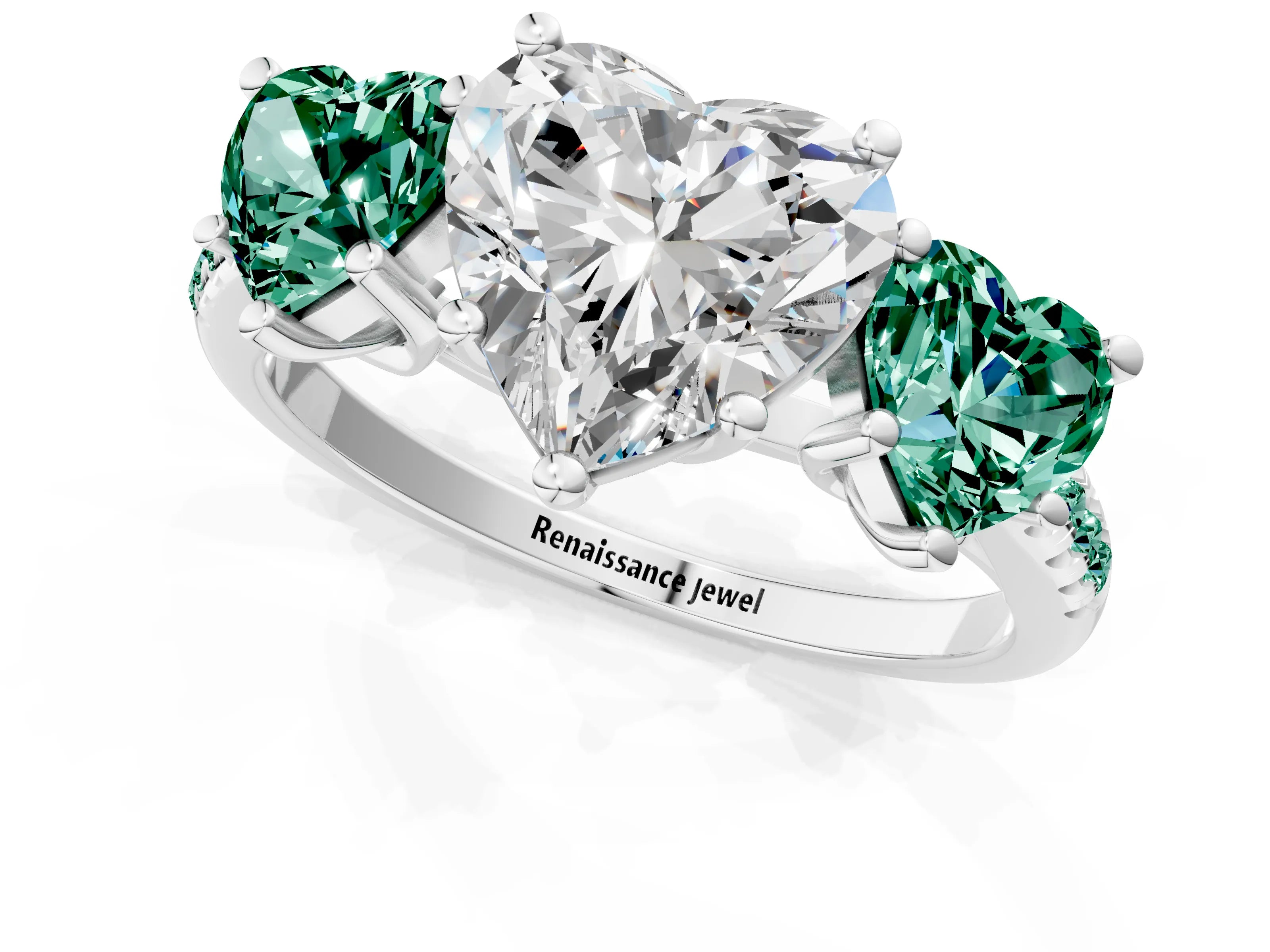 White gold Three-Stone Heart Cut Diamond Ring with Round with Green Sapphire side stone Pavé Band and Prong Setting_1