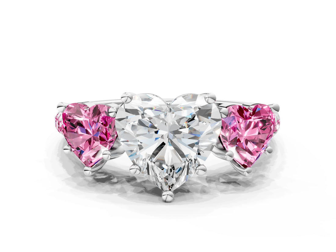 White gold Three-Stone Heart Cut Diamond Ring with Round with Pink Sapphire side stone Pavé Band and Prong Setting