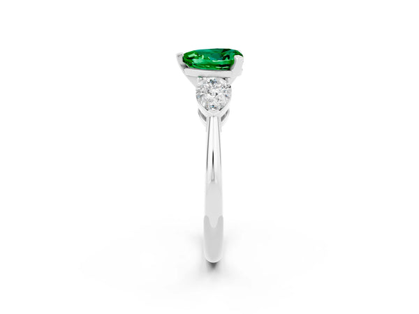 Silver Three-Stone Heart Cut Emerald Ring with Pear Side Stones and Four-Prong Setting
