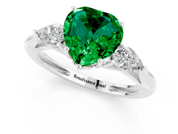 Platinum Three-Stone Heart Cut Emerald Ring with Pear  Side Stones in Four-Prong Setting