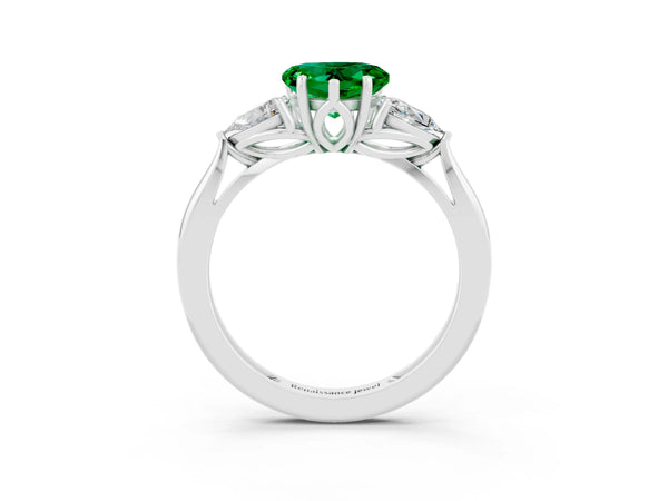 Platinum Three-Stone Heart Cut Emerald Ring with Pear  Side Stones in Four-Prong Setting