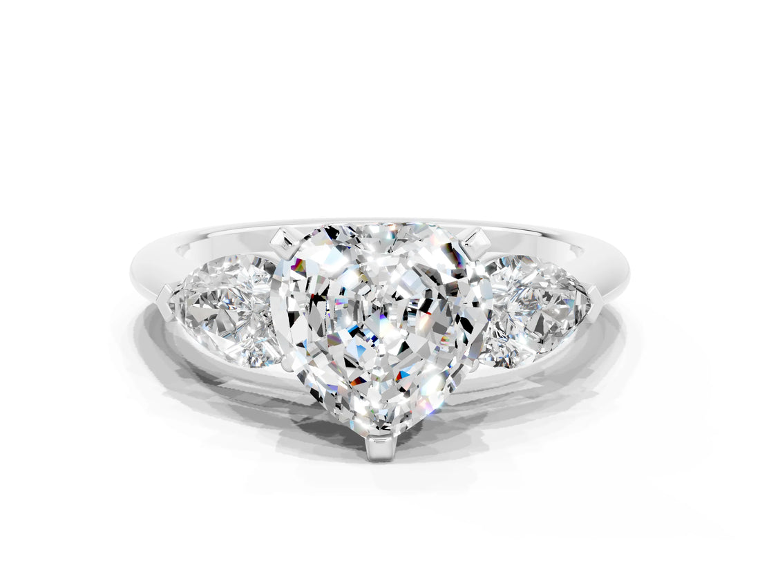 White gold Three-Stone Heart Cut Moissanite Ring with Pear Side Stones and Four-Prong Setting