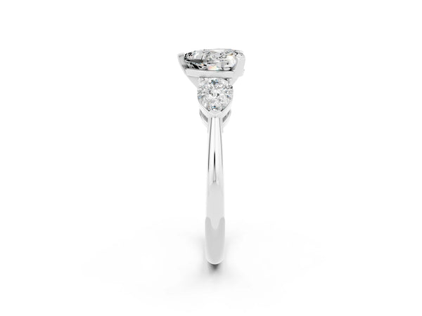 White gold Three-Stone Heart Cut Moissanite Ring with Pear Side Stones and Four-Prong Setting