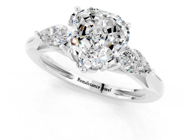 Platinum Three-Stone Heart Cut Moissanite Ring with Pear  Side Stones in Four-Prong Setting