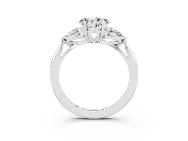 Platinum Three-Stone Heart Cut Moissanite Ring with Pear  Side Stones in Four-Prong Setting
