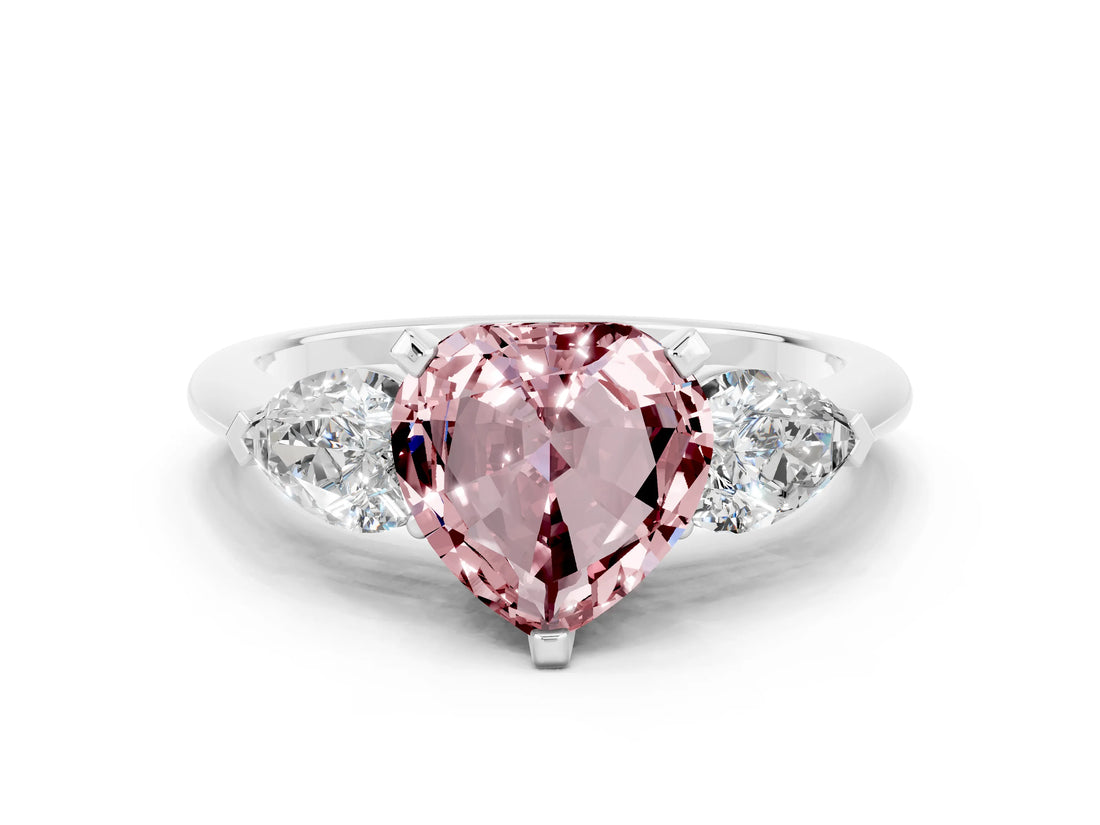 White gold Three-Stone Heart Cut Morganite Ring with Pear Side Stones and Four-Prong Setting
