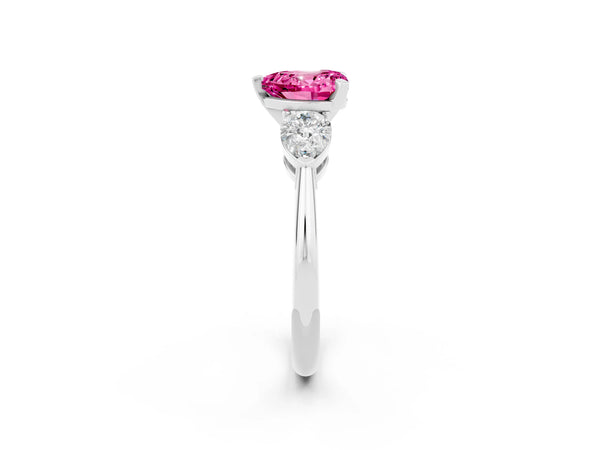 Platinum Three-Stone Heart Cut Pink Sapphire Ring with Pear Side Stones and Four-Prong Setting