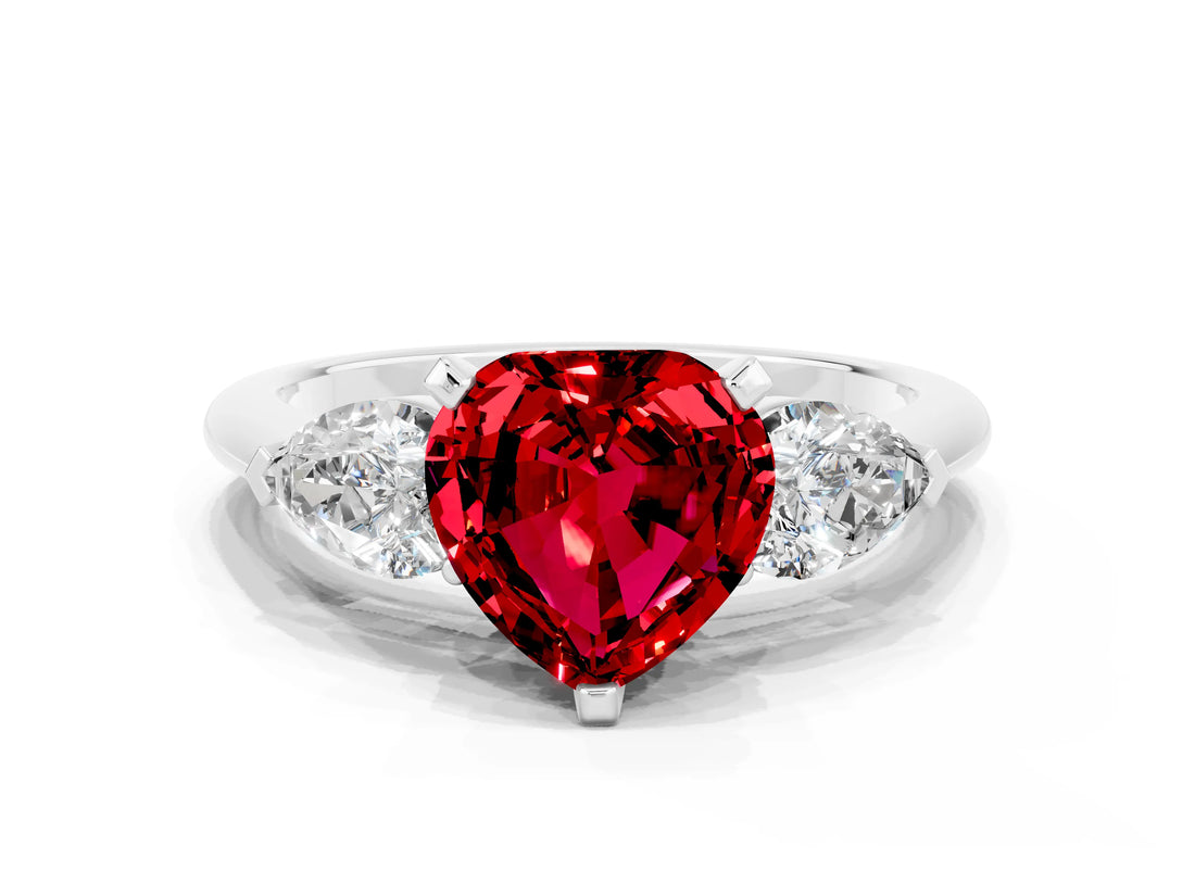 White gold Three-Stone Heart Cut Ruby Ring with Pear Side Stones and Four-Prong Setting