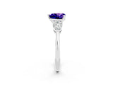 White gold Three-Stone Heart Cut Tanzanite Ring with Pear Side Stones and Four-Prong Setting_2