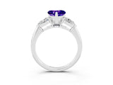 White gold Three-Stone Heart Cut Tanzanite Ring with Pear Side Stones and Four-Prong Setting_3