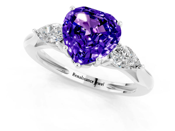 Platinum Three-Stone Heart Cut Tanzanite Ring with Pear  Side Stones in Four-Prong Setting