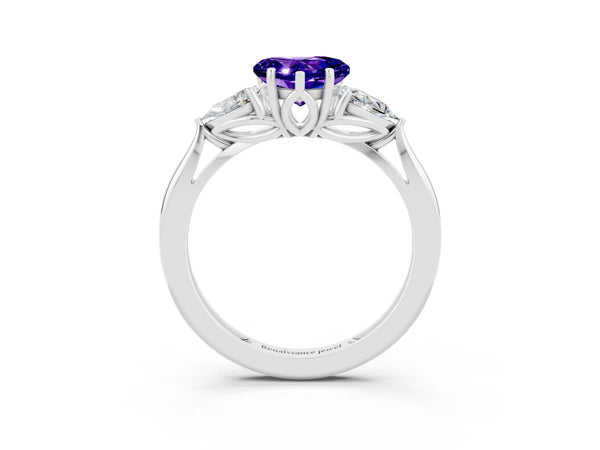 Silver Three-Stone Heart Cut Tanzanite Ring with Pear  Side Stones in Four-Prong Setting