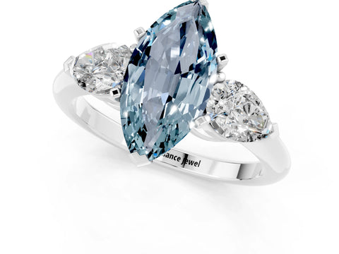 White gold Three-Stone Marquise Cut Aquamarine Ring with Pear Side Stones and Four-Prong Setting_1