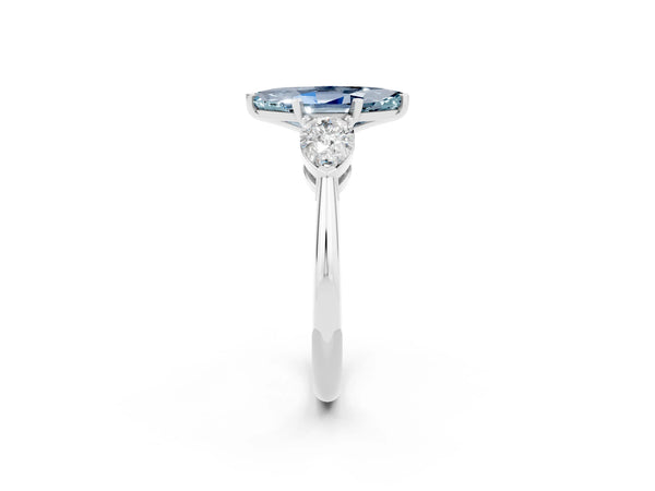 White gold Three-Stone Marquise Cut Aquamarine Ring with Pear Side Stones and Four-Prong Setting