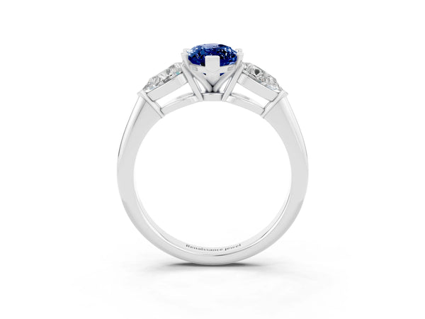 Silver Three-Stone Marquise Cut Blue Sapphire Ring with Pear Side Stones and Four-Prong Setting